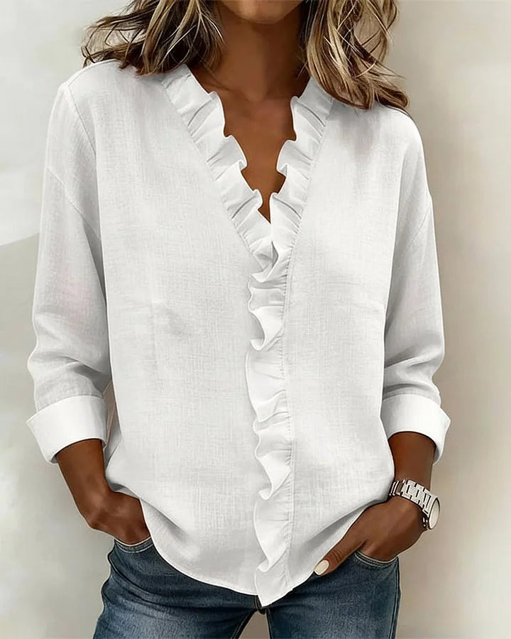 Indie · Blusa con volantes y cuello en V