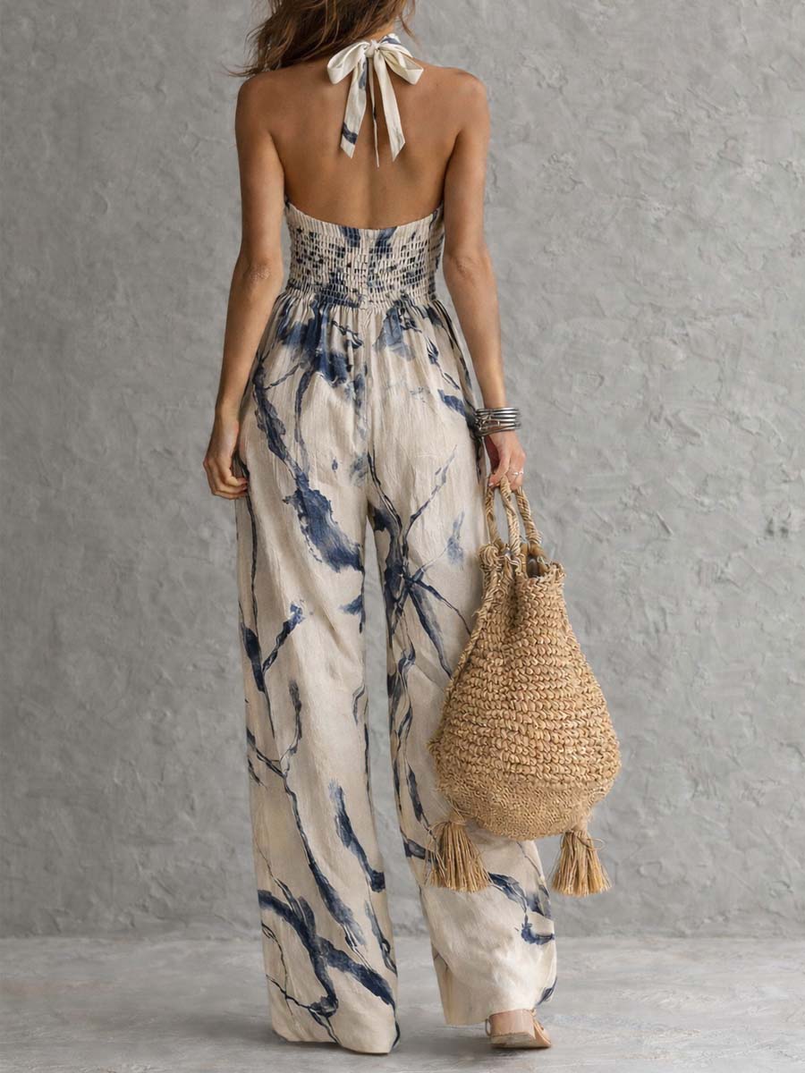 Mono de cuello halter y pernera ancha con estampado lavado en tinta y bolsillos