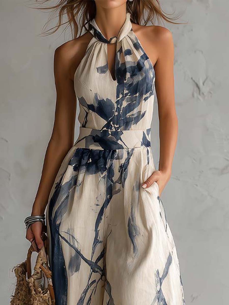 Mono de cuello halter y pernera ancha con estampado lavado en tinta y bolsillos